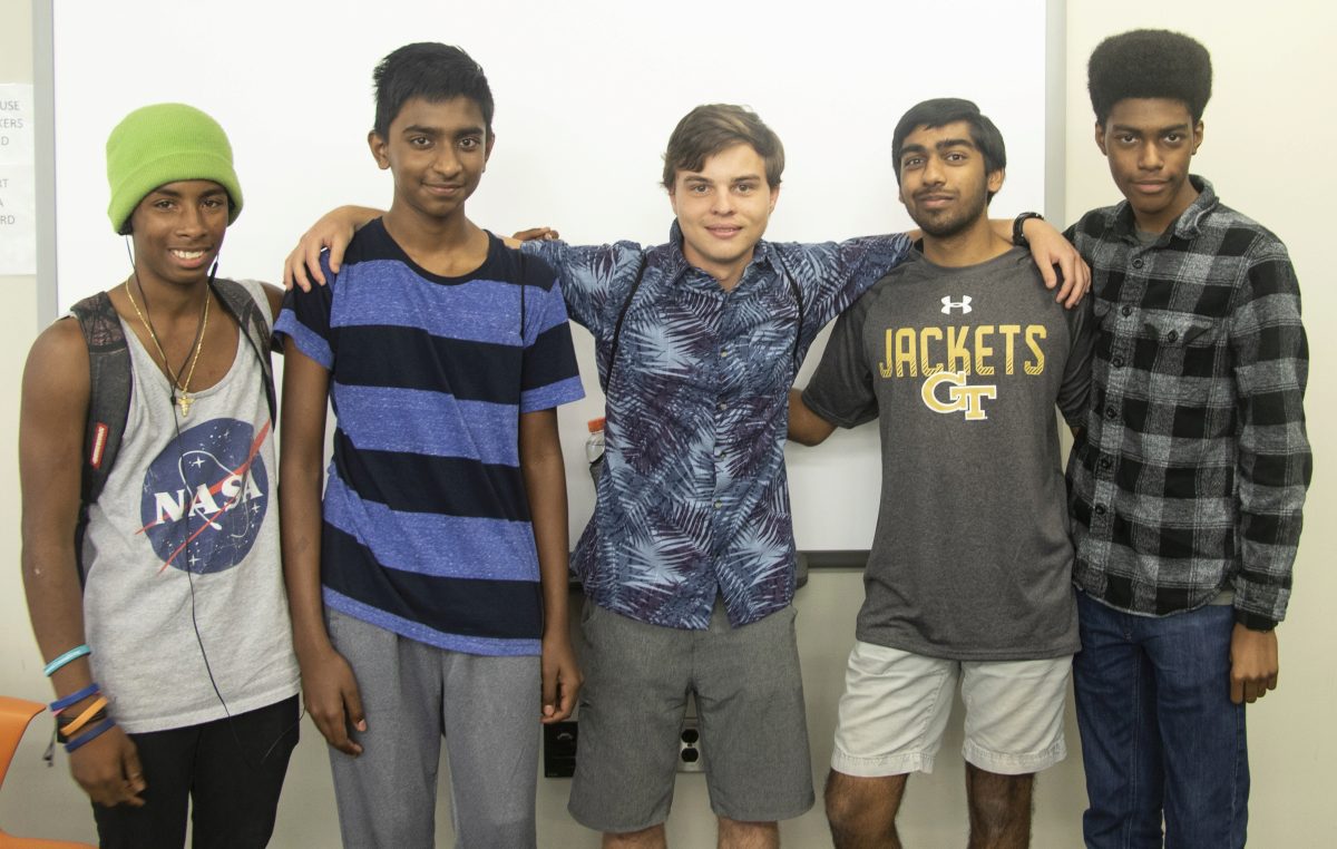 The five students in Team 2, which won the IMEET challenge