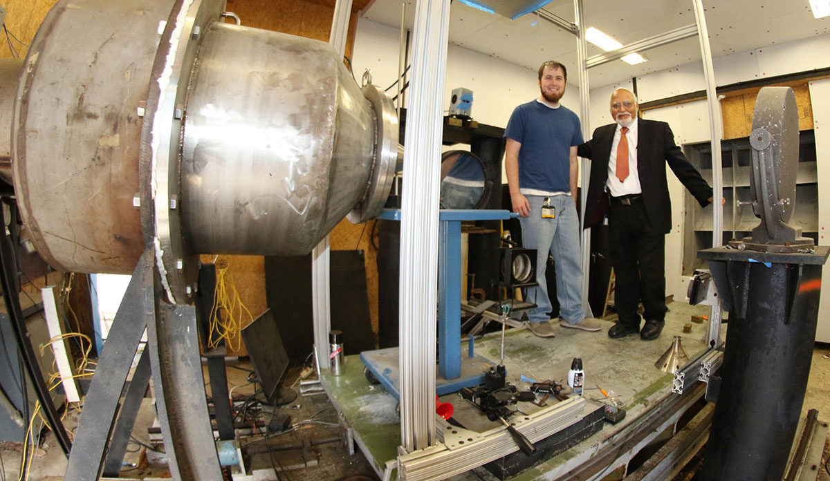 Ahuja in the lab with his former doctoral student, Nick Breen (now a research engineer)