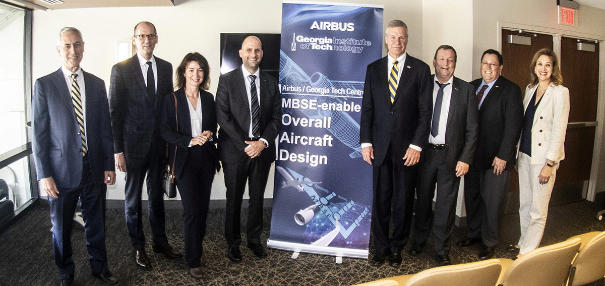 President Peterson, and Dean McLaughlin  with the Airbus executives at the signing ceremony