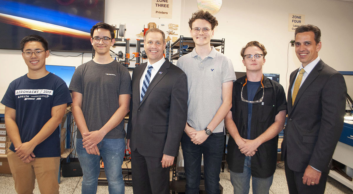 Jim Bridentstine and Congressman Tom Graves with four Aero Maker Space students