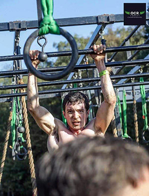 Jared Mehnert looping his way through a jungle gym on the OCR course