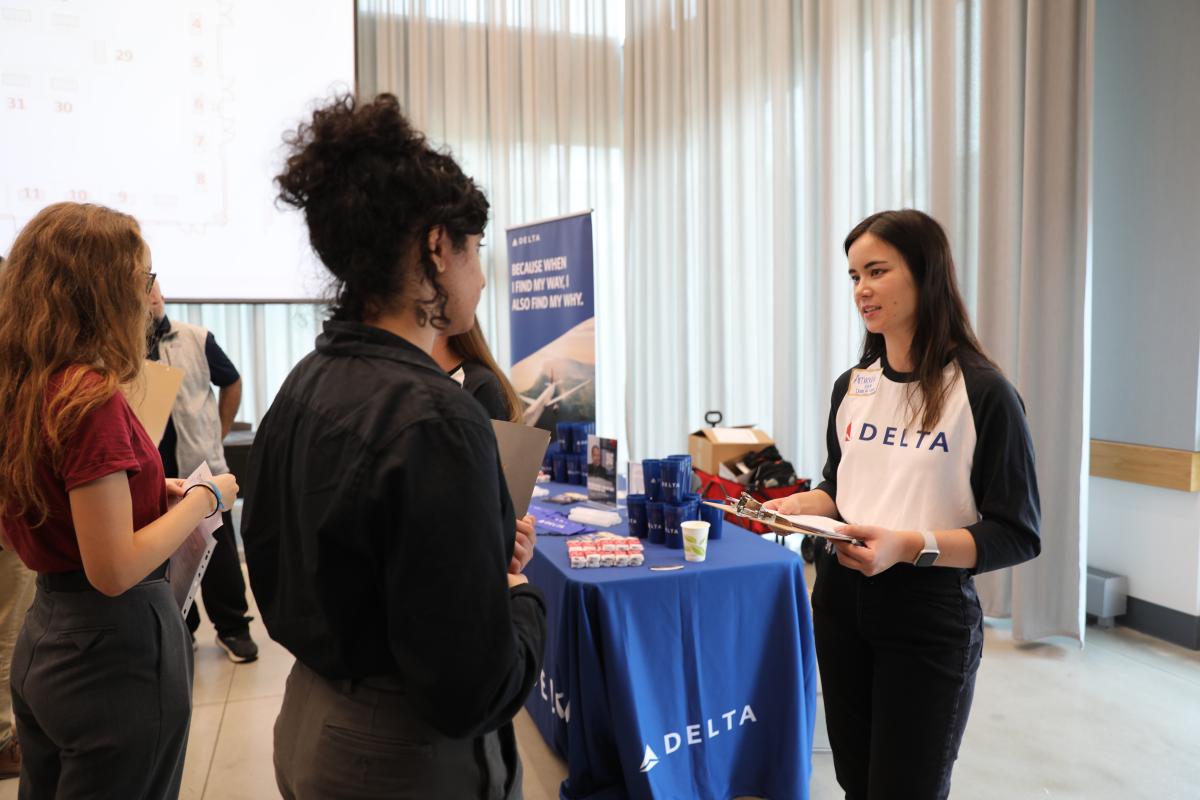 Aerospace engineering students talk with recruiters during the latest AE School Career Fair