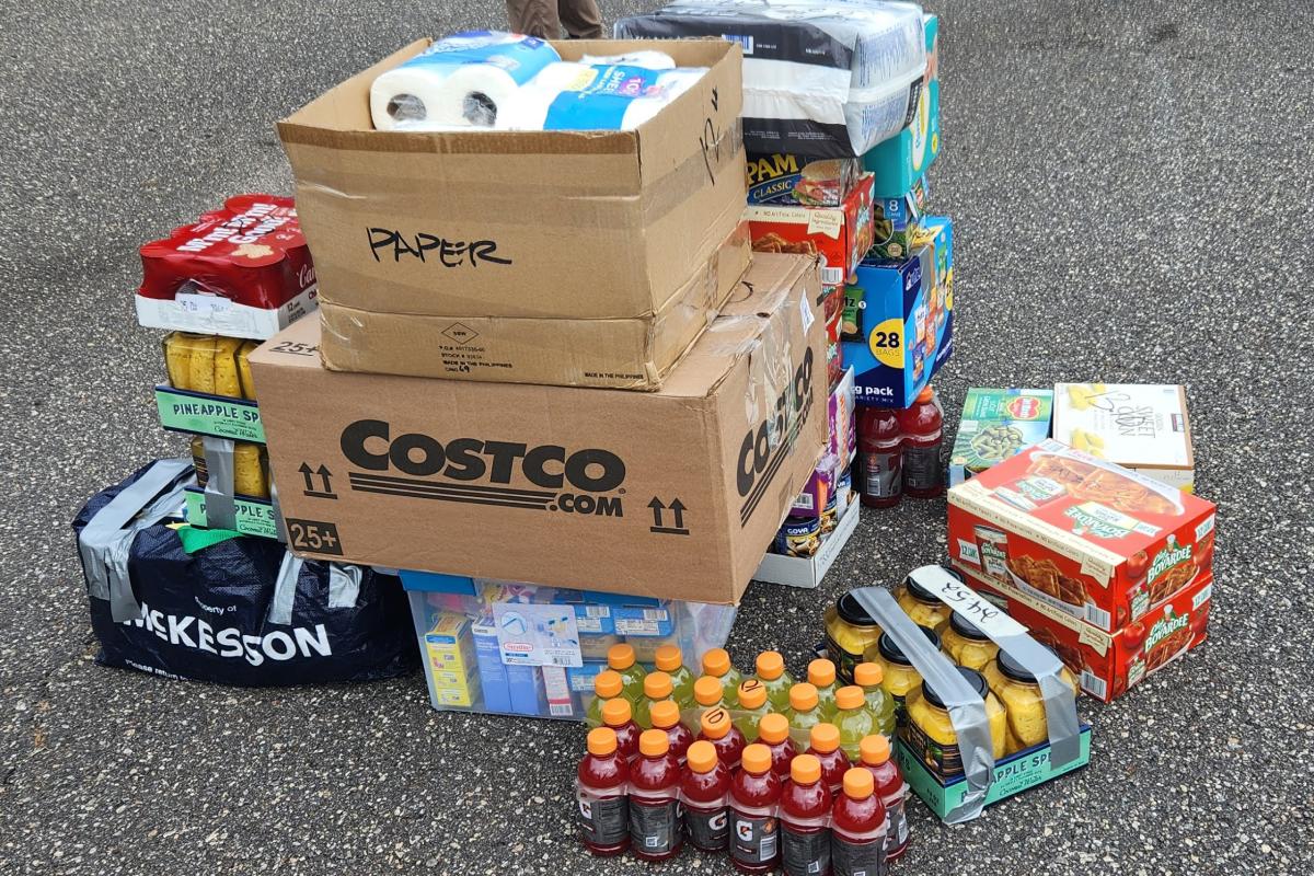 a pile of non-perishable food and essential goods