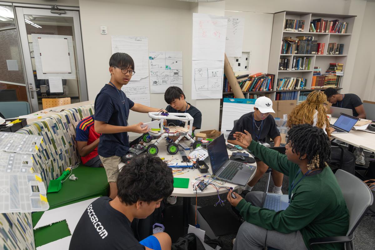 students working in drones