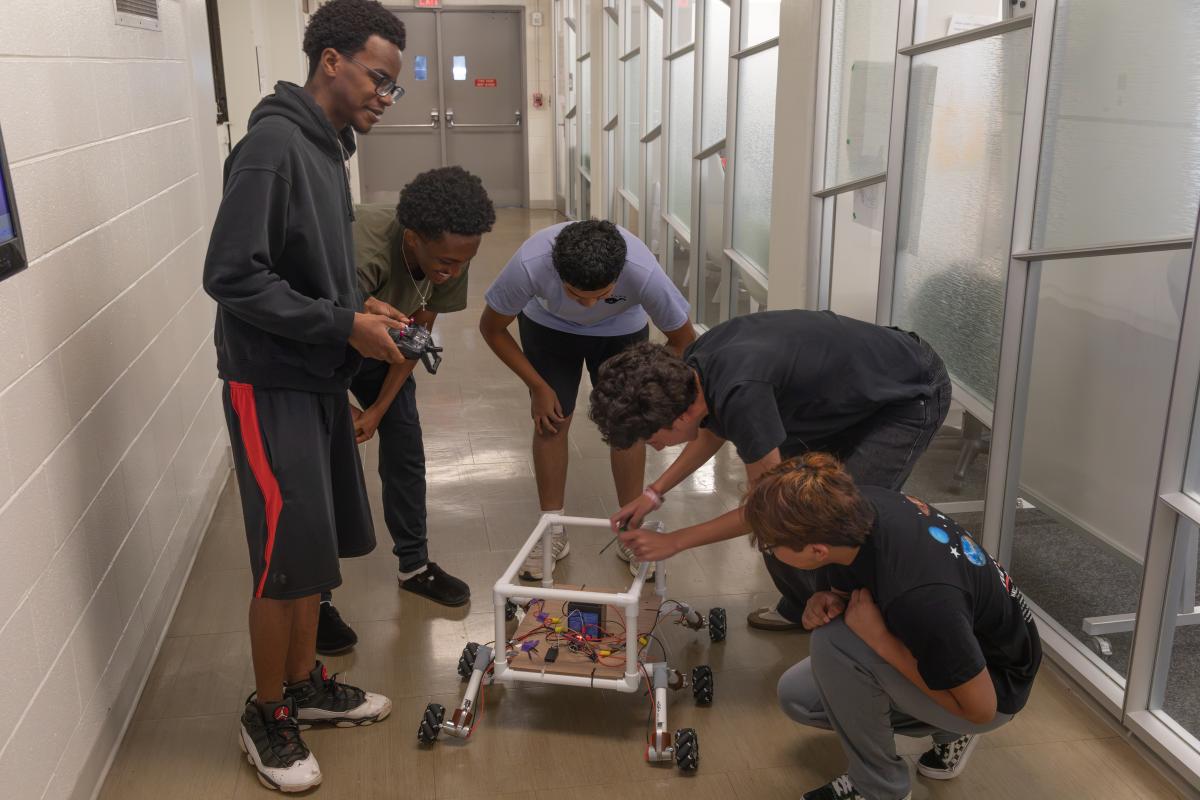 students working on rover